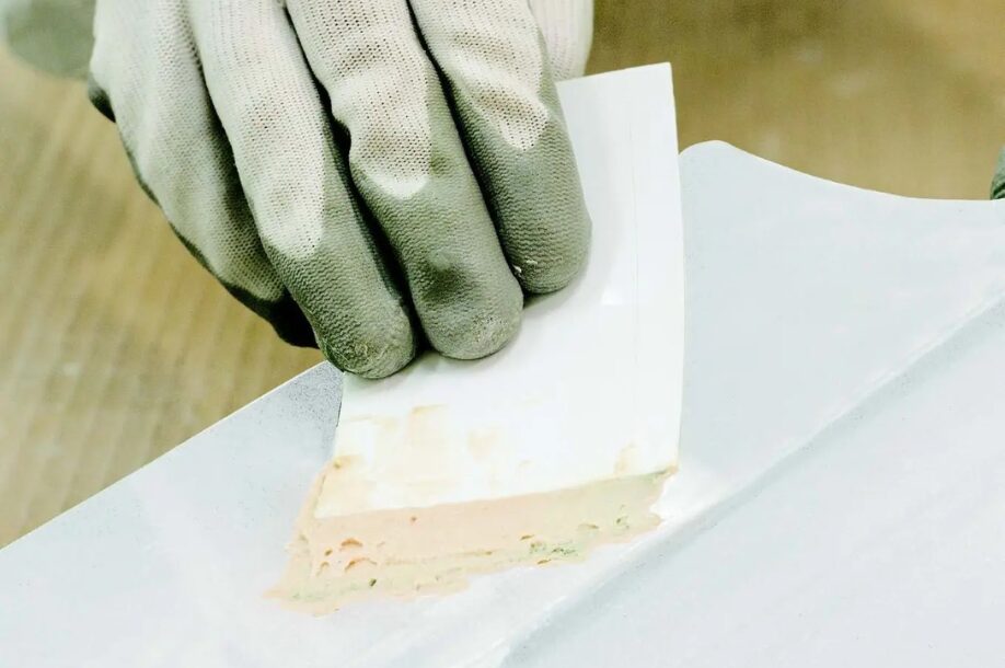 Applying S9 Filler onto Composite Material